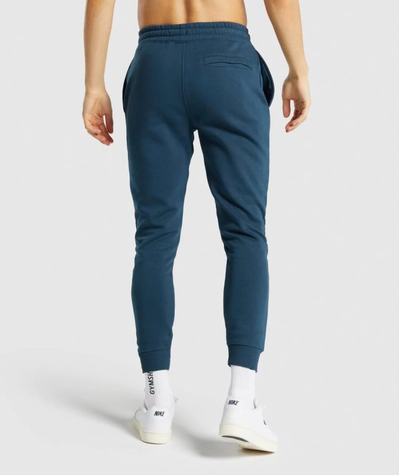 Gymshark Crest Mjukisbyxor Herr Marinblå | SE-73651H